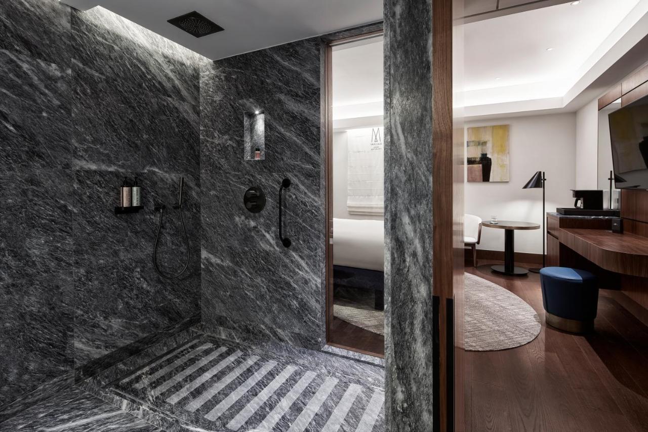 Athens Capital Center Hotel - Mgallery Collection Esterno foto A bathroom at the hotel