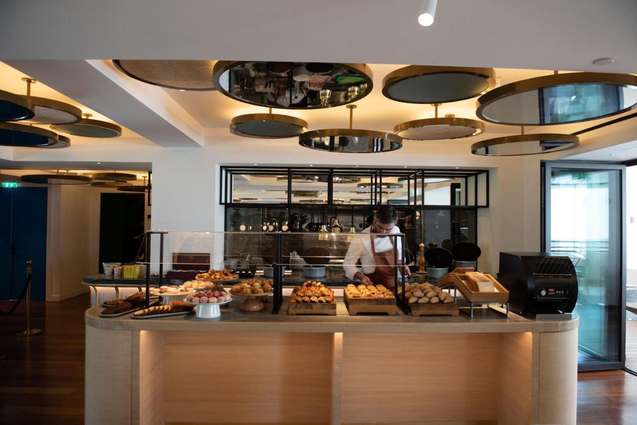 Athens Capital Center Hotel - Mgallery Collection Esterno foto The buffet at the lounge