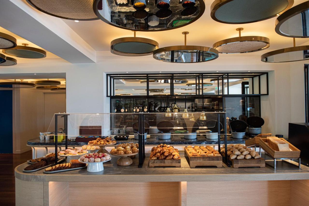 Athens Capital Center Hotel - Mgallery Collection Esterno foto The buffet at the restaurant