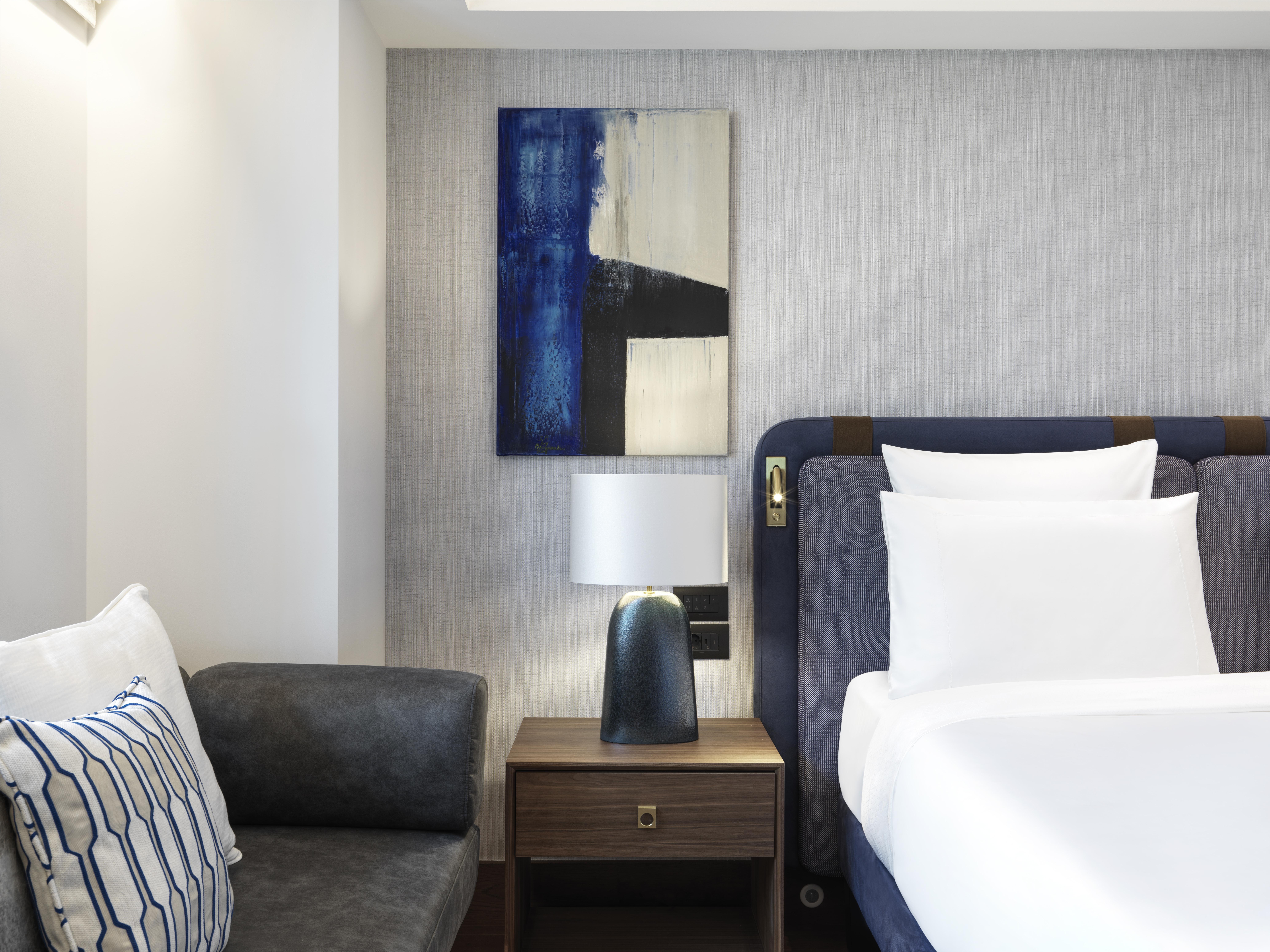Athens Capital Center Hotel - Mgallery Collection Esterno foto A bedroom at the hotel