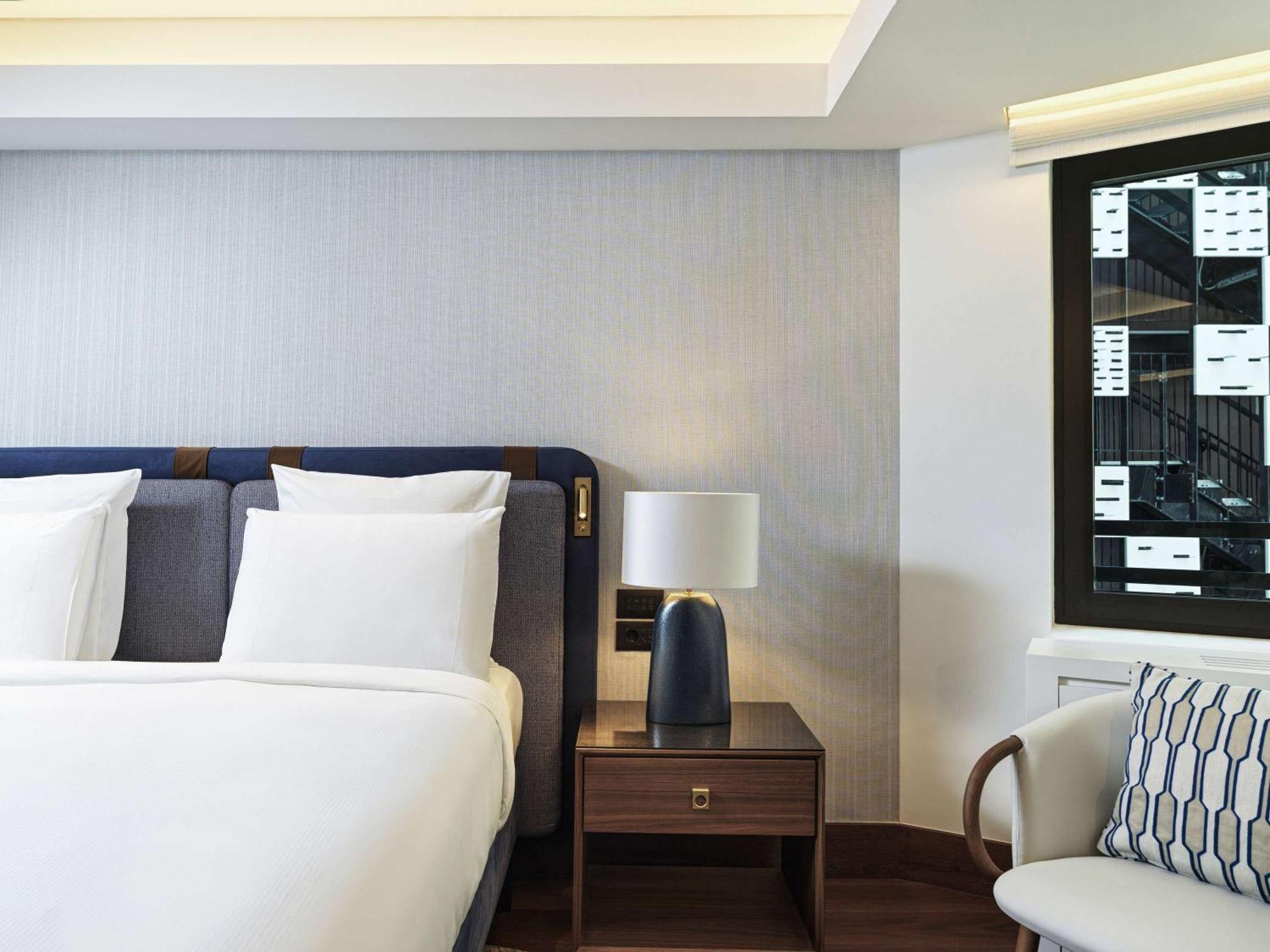 Athens Capital Center Hotel - Mgallery Collection Esterno foto A bedroom at the hotel